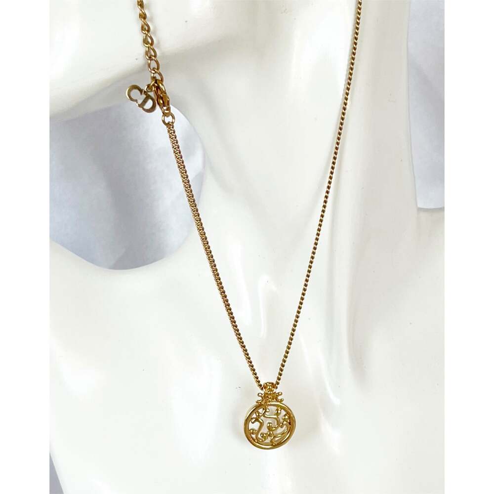 CHRISTIAN DIOR Vintage Pendant Necklace Round Gold Plated Circa 1980 Avant Garde